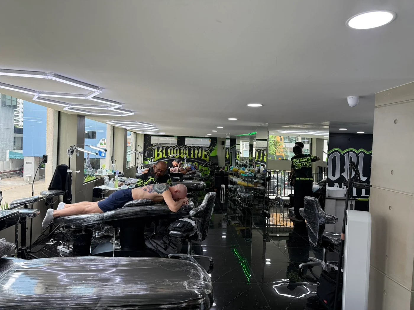 Clean appointment-only tattoo studio interior in Bangkok