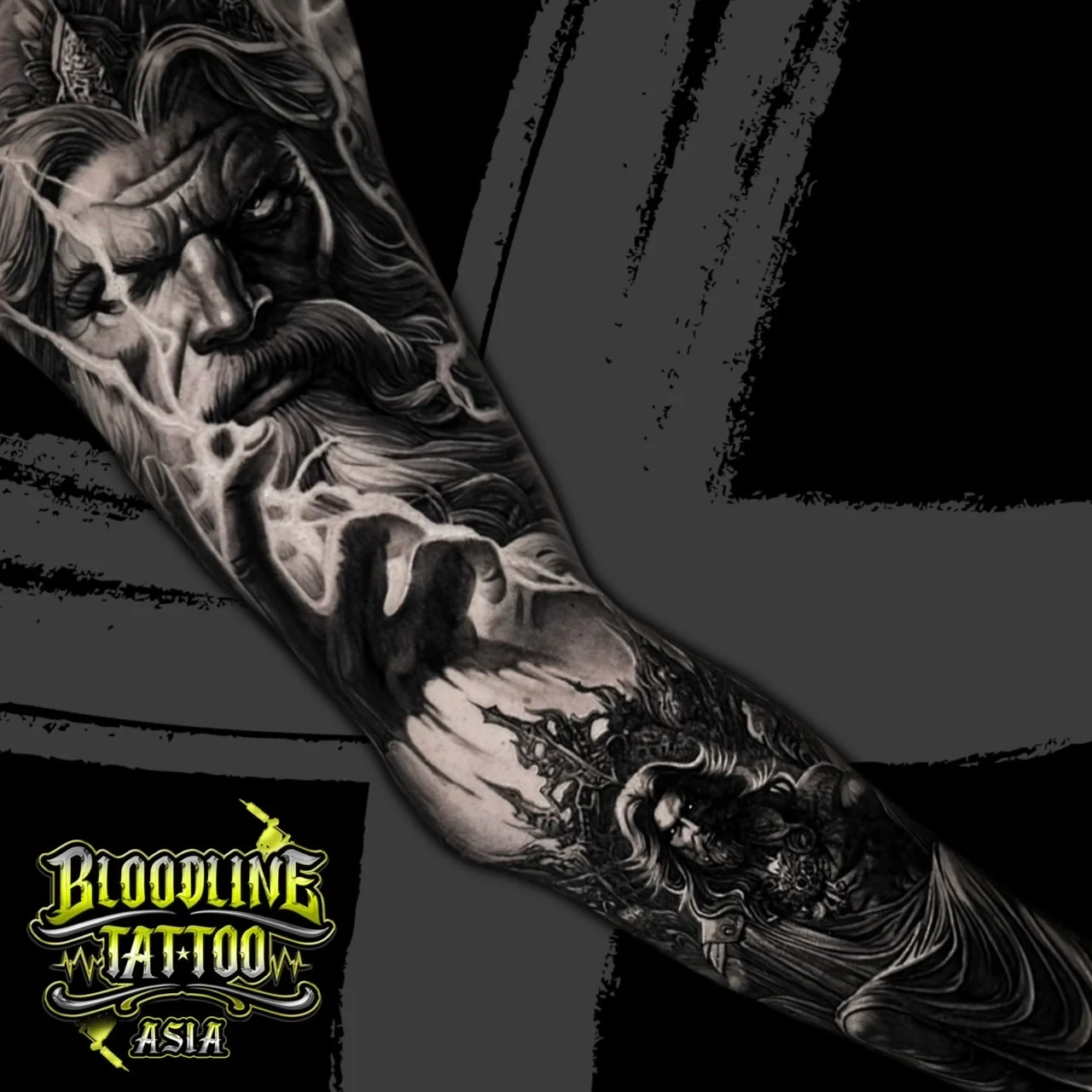 Black and grey realism sleeve with Zeus portrait, lightning, and armored Poseidon with trident in mythological shading, at Bloodline Tattoo Bangkok.
